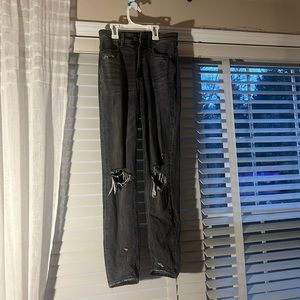 American Eagle black distressed straight leg jeans.